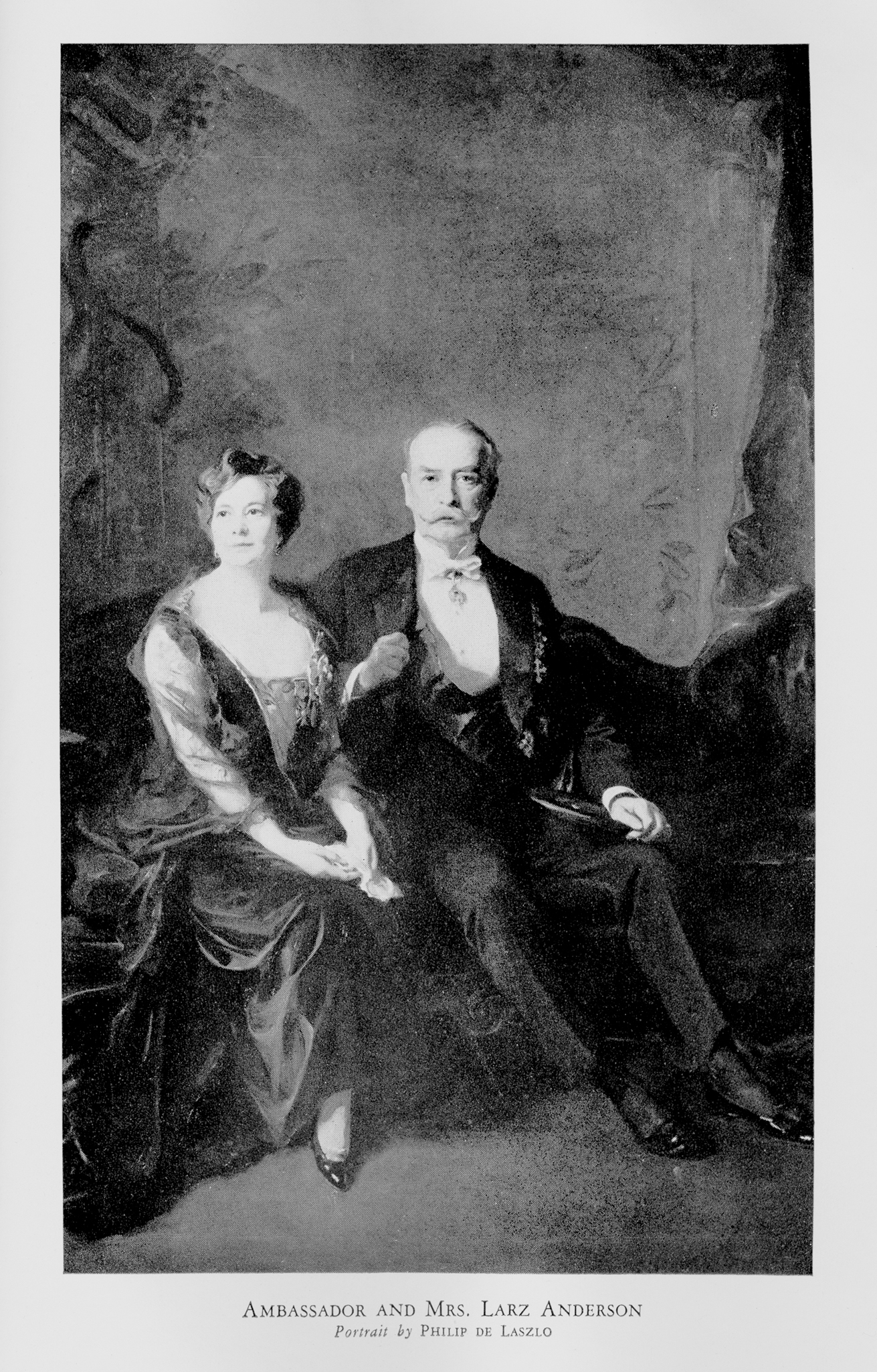 Black-and-white portrait of well-dressed couple