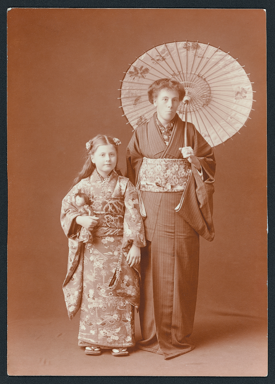 Sepia photograph of woman and young girl wearing kimonos