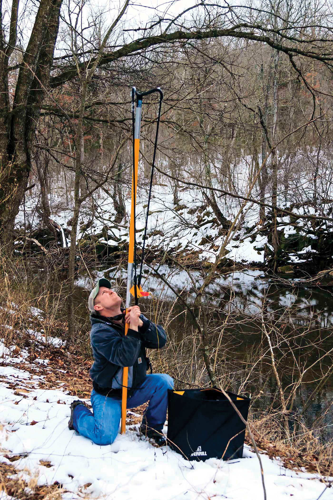 Photo of author using collecting slingshot