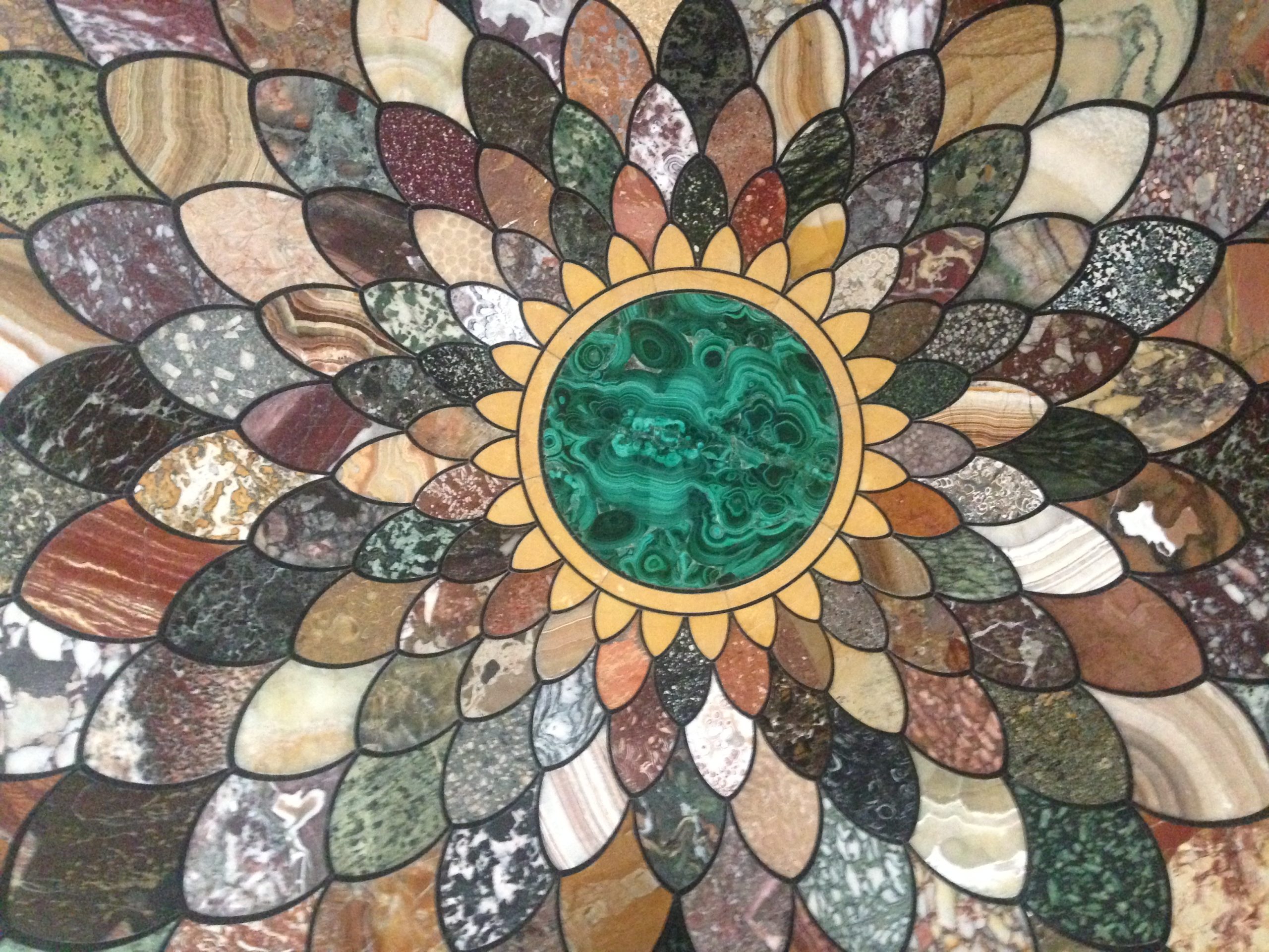 Tabletop inlaid with semi-precious stones.