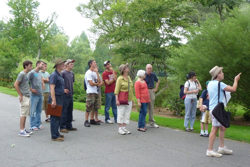 Volunteer Docent leading a tour. Photographs by Jon Hetman, Nancy Sableski, Kevin Schofield, and Julie Warsowe.