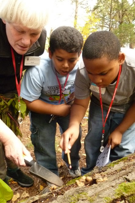 Volunteer Field Study Guide with children on Hemlock Hill. Photographs by Jon Hetman, Nancy Sableski, Kevin Schofield, and Julie Warsowe.