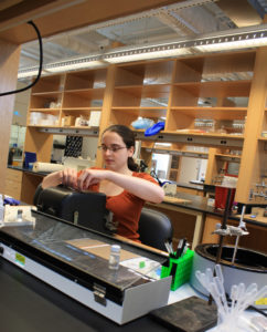 Graduate student, Rebecca Povilus, in the East Labs.