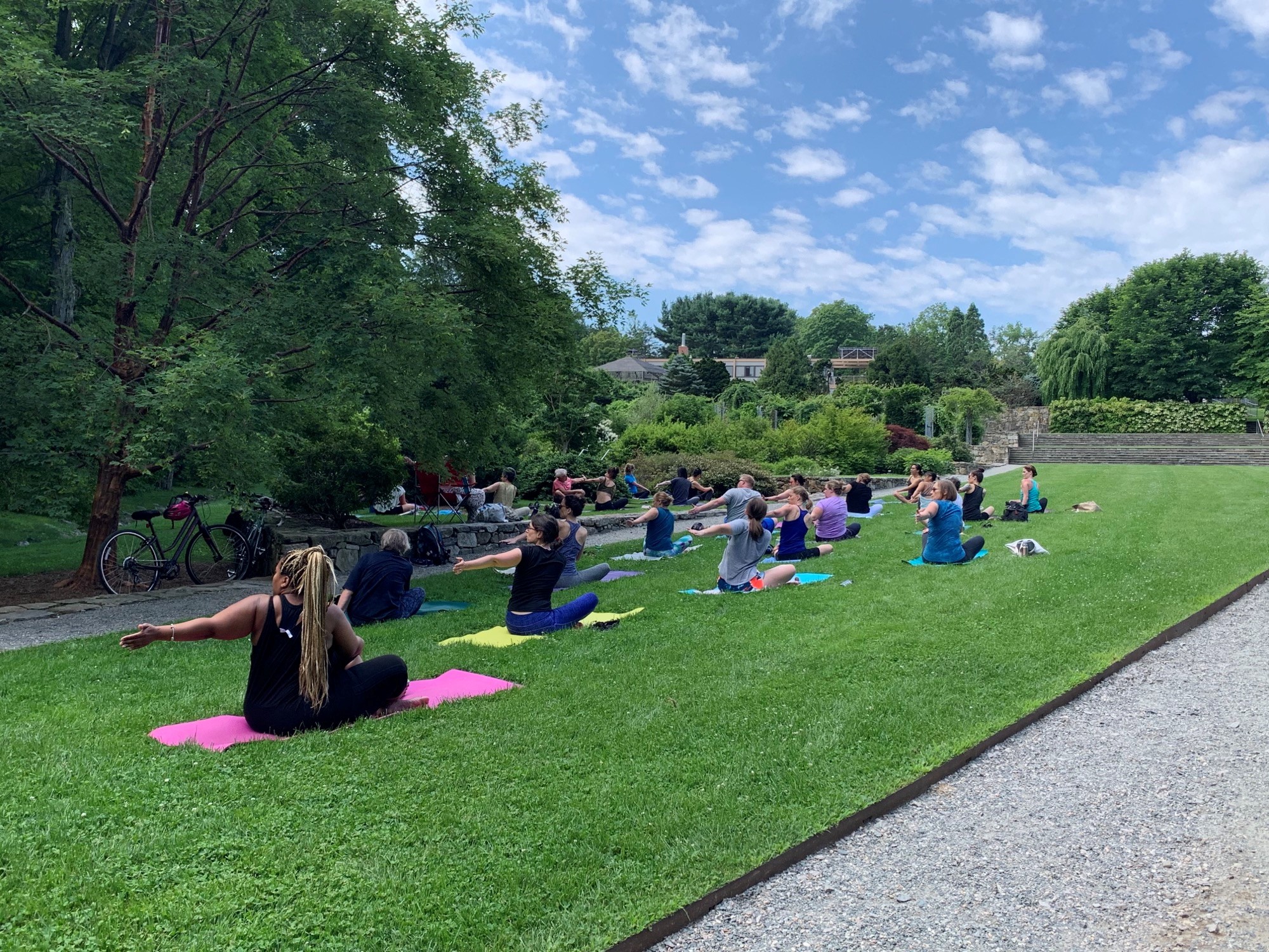 Yoga on a sunny day in the Leventritt Shrub and Vine Garden