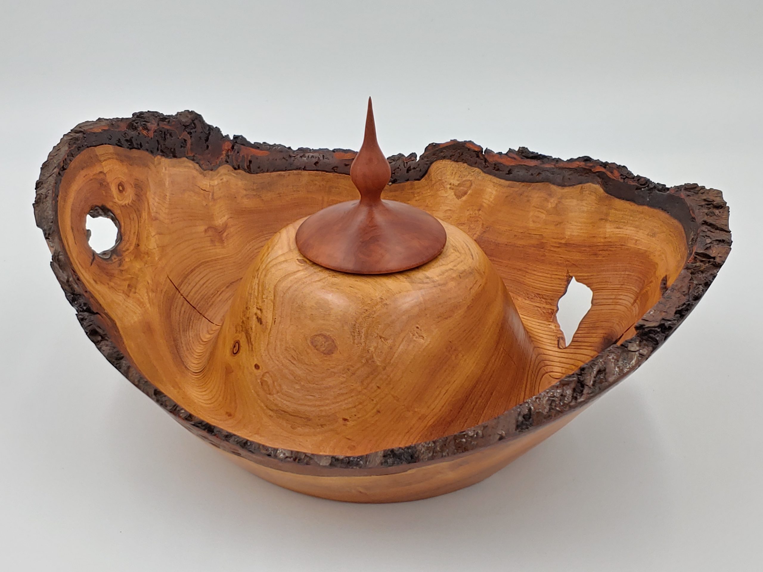 Natural edge wood bowl with finial