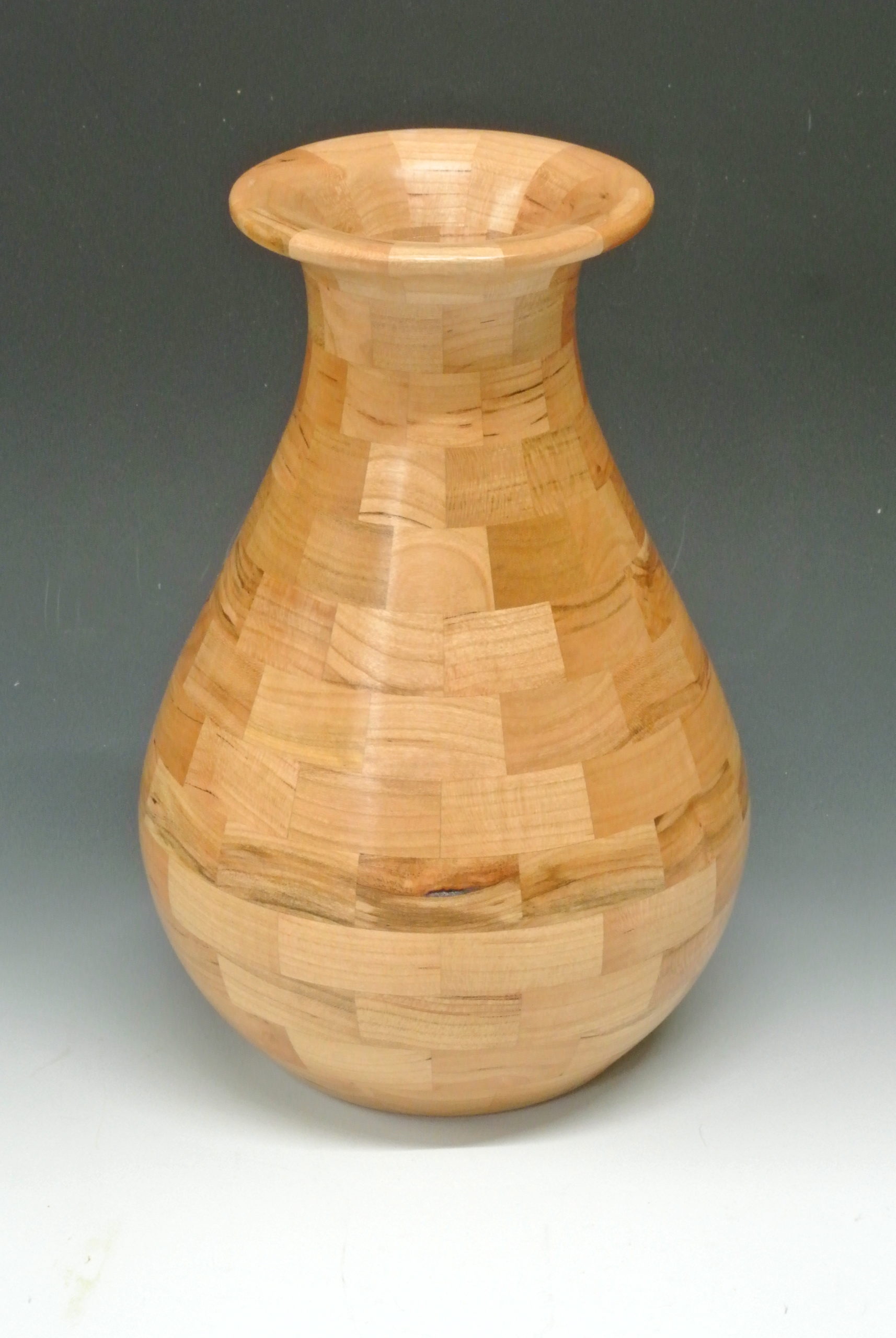 Turned wood, symetrical vase