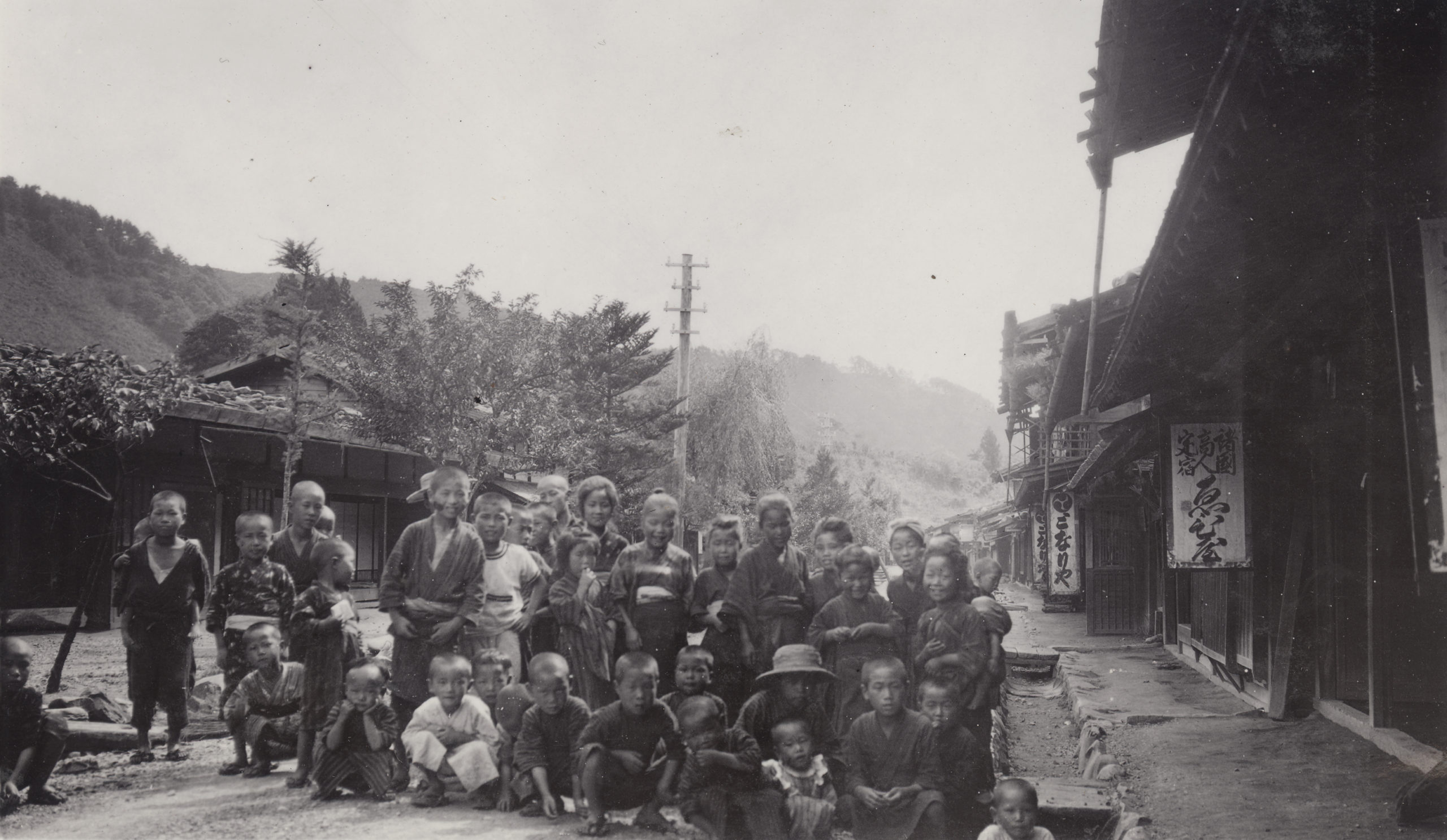 Children on street at Miyanokoshi, Japan, were photographed by John Jack on September 3, 1905.