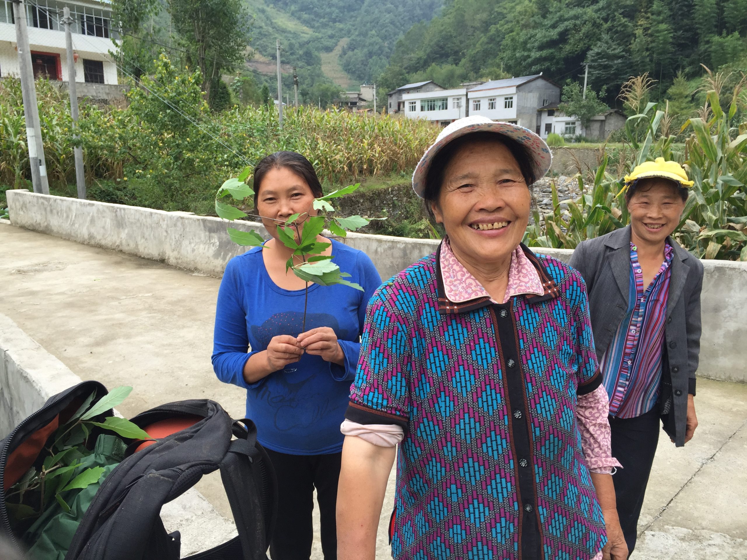 Local ladies in Gao Nan Zhen, Chengkou, smile for the camera.