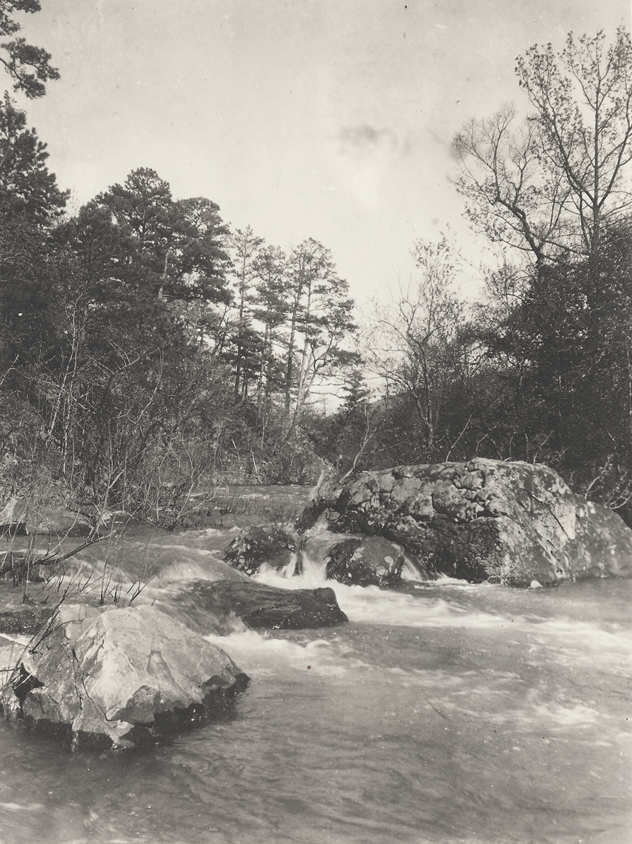 A view of rapids in Big Creek, Page, Oklahoma, captured by Ernest Palmer in April 1922.