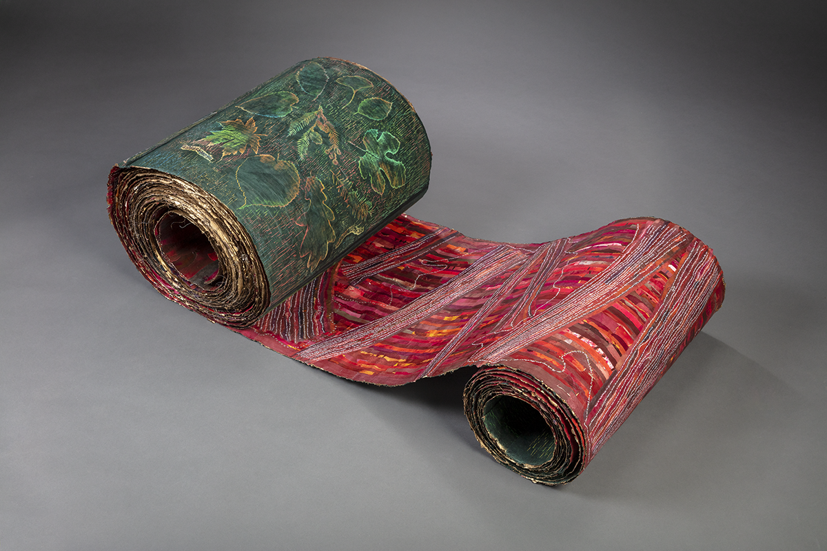 Art scroll with text and leaf prints