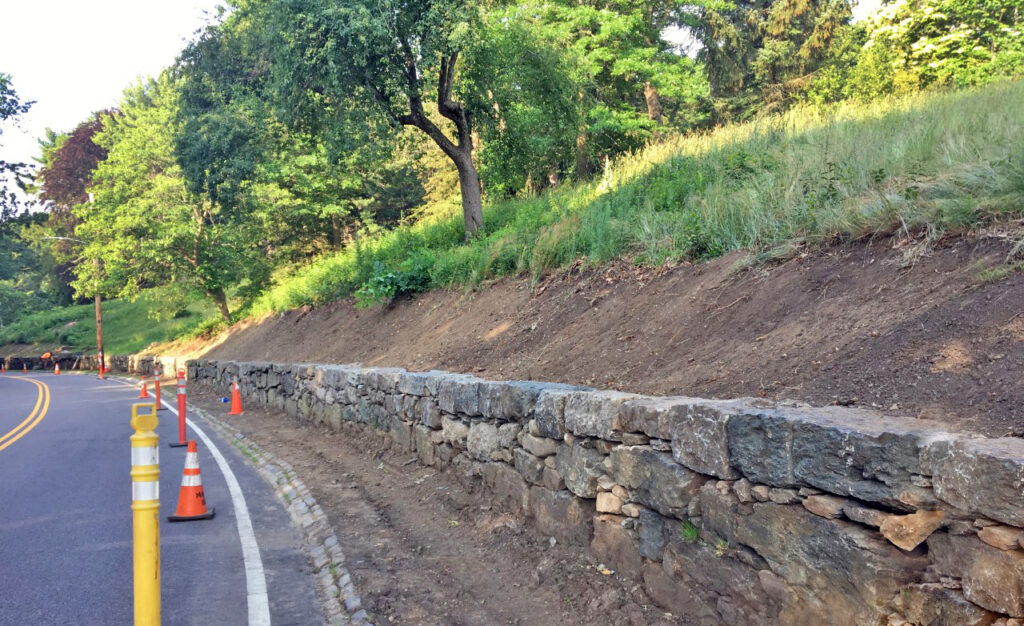 Stone walls under repair along South Street