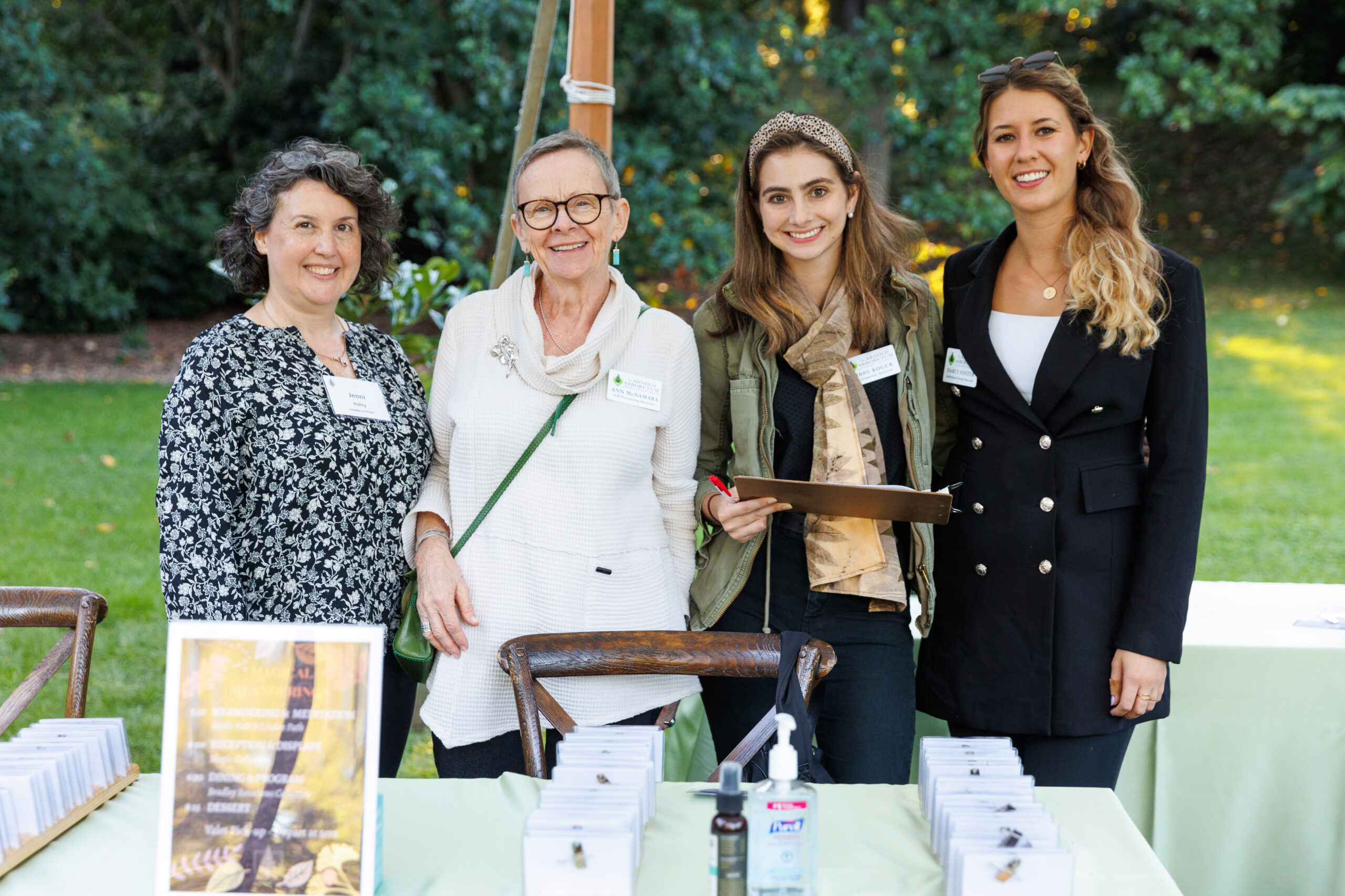 Arboretum staff at the event registration tent, September 19, 2023, during Magical Meanderings Autumn Dinner
