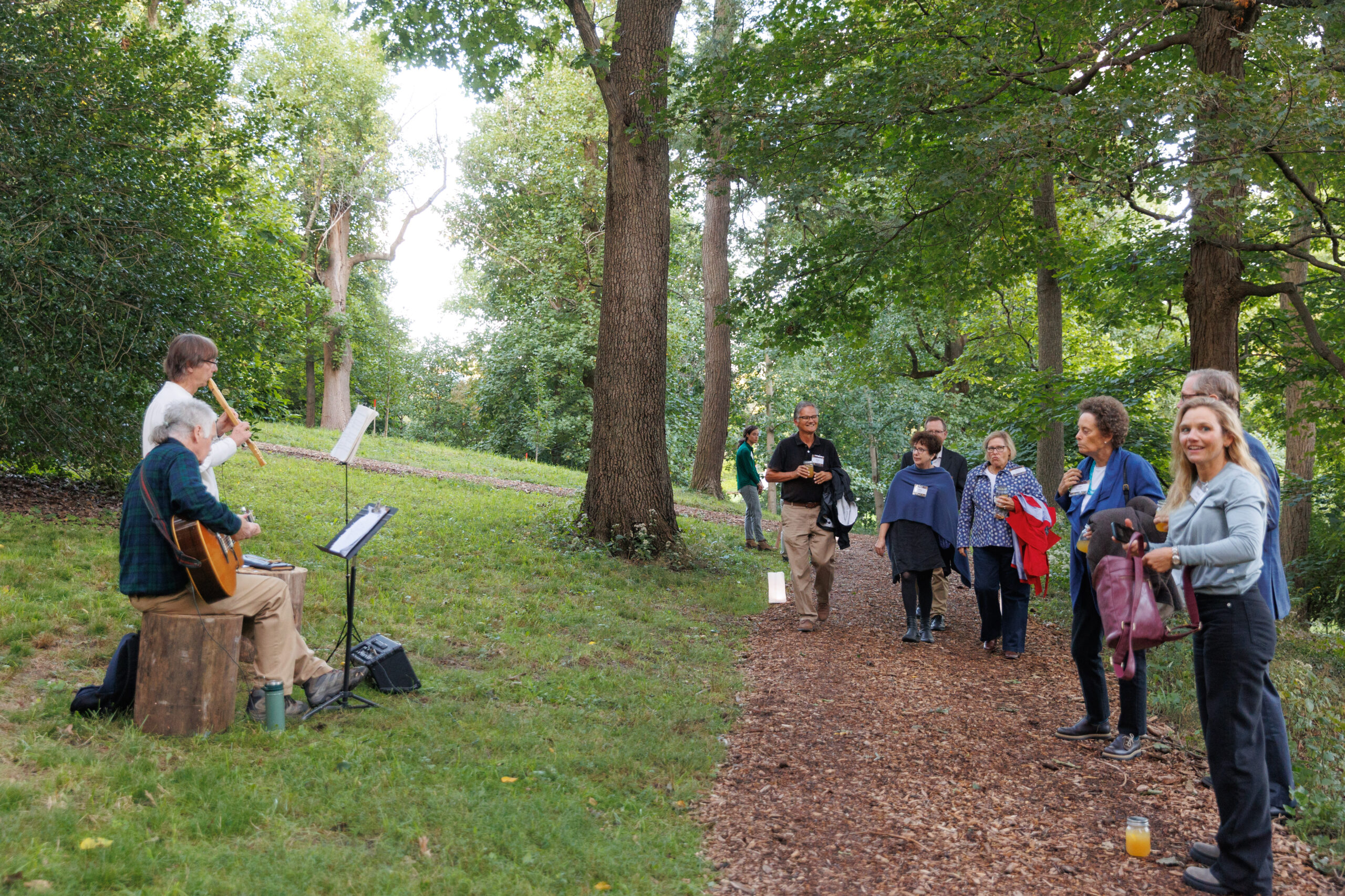 Musicians and guests on Bridle Path at Magical Meanderings Autumn Dinner, September 19, 2023