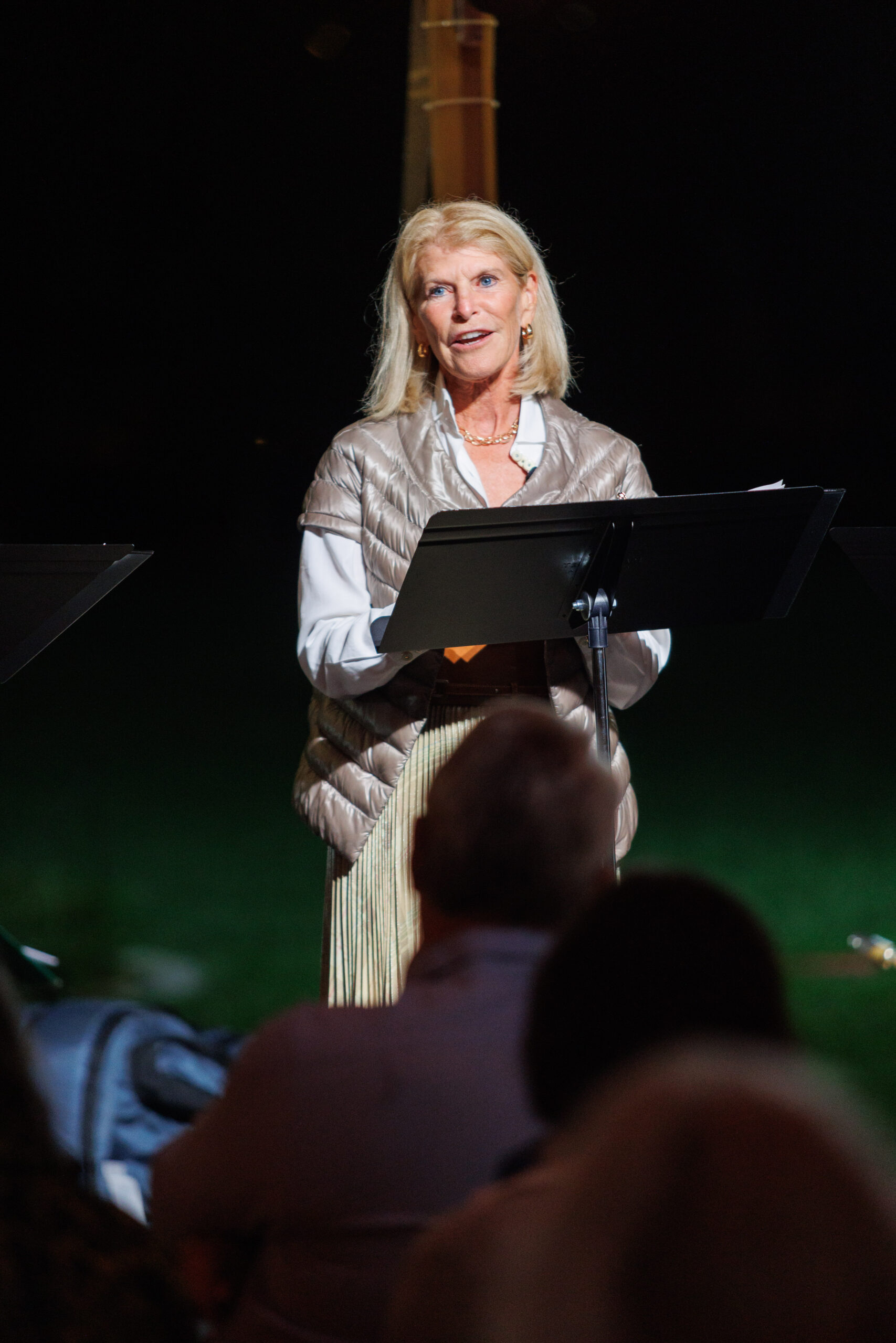 Event co-chair RoAnn Costin addresses guests at Magical Meanderings Autumn Dinner, September 19, 2023