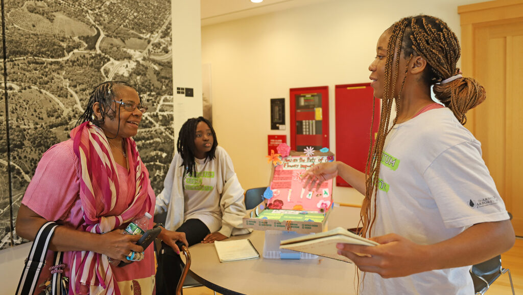 Arboretum Young Scientists present their science projects as part of the program's graduation event on August 1.