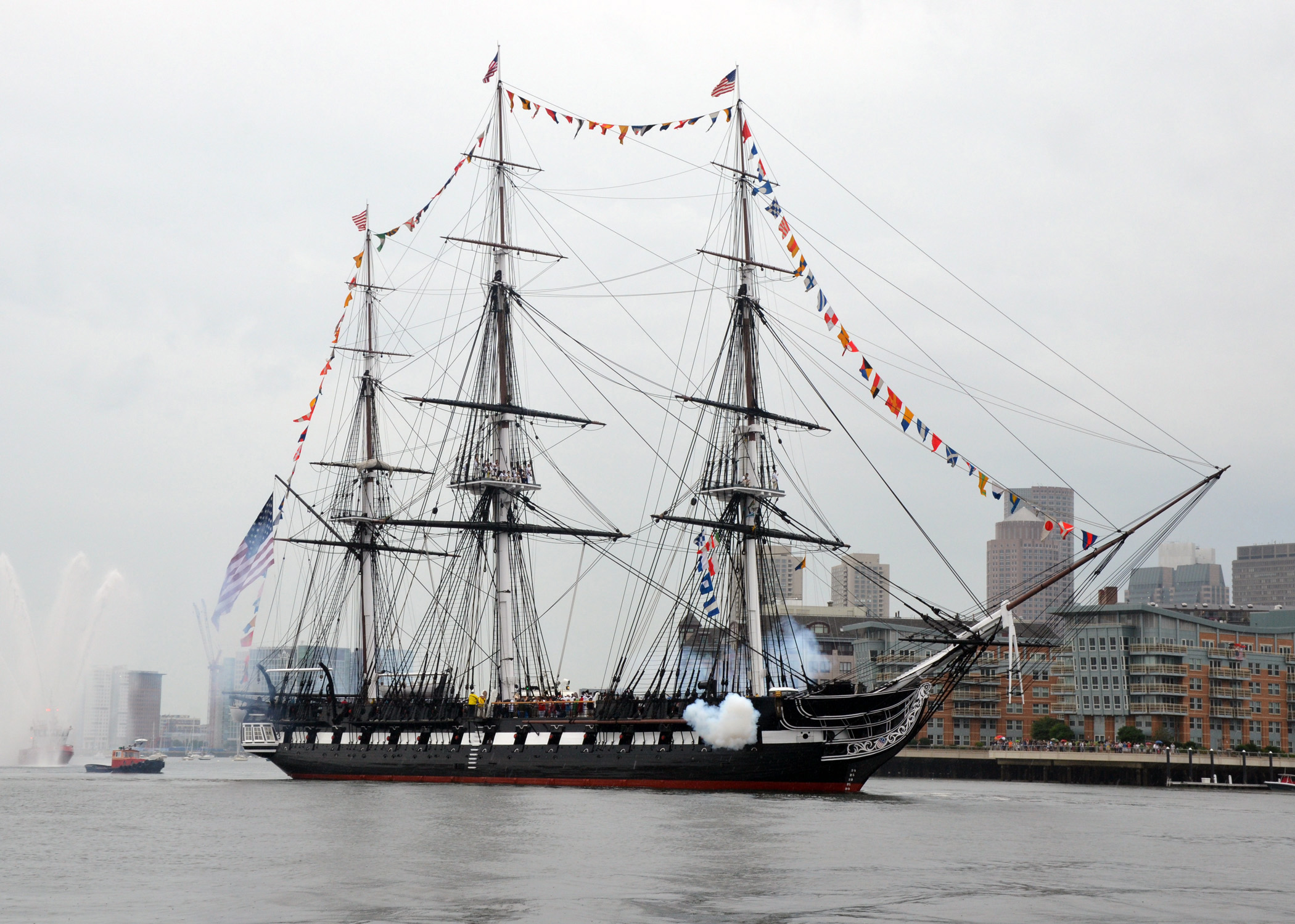 Large colonial ship in a harbor