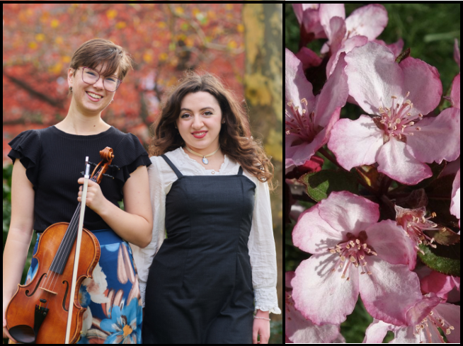 Two young women, one with a violin, and pink crabapple flowers