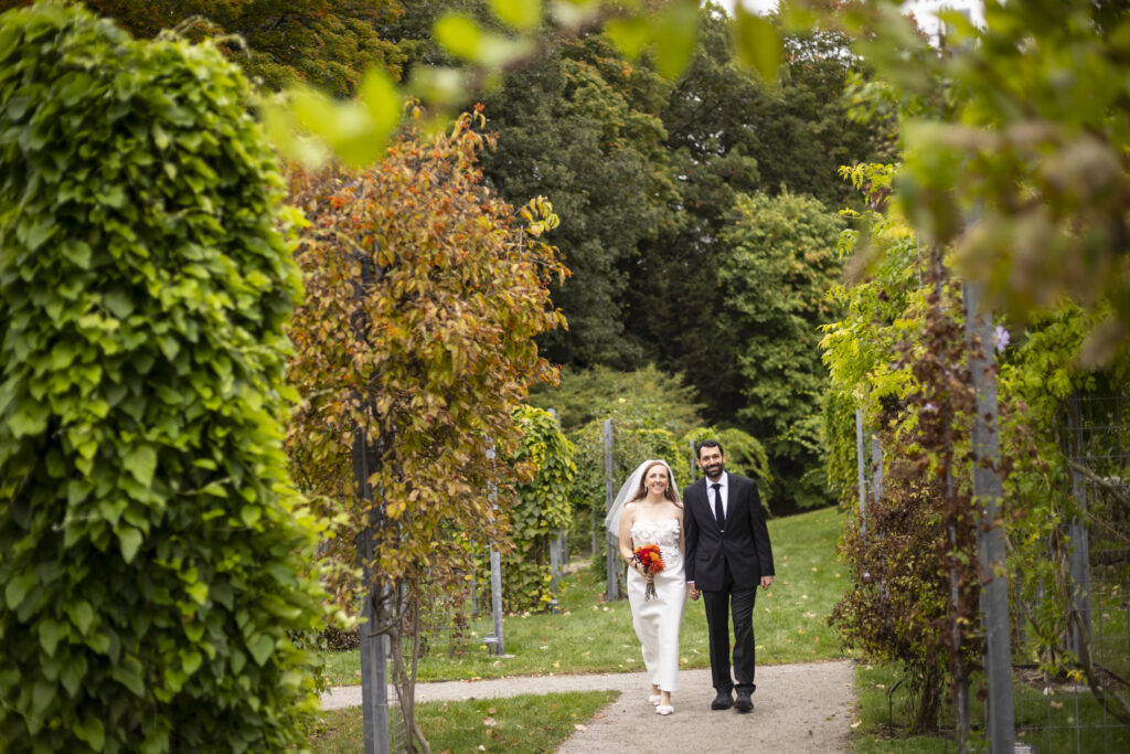Kerry and Caleb Evanter on their wedding day in the Leventritt Garden
