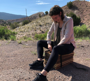 Photo of Andrea Appleton sitting outside.